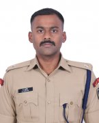 E. Karthik